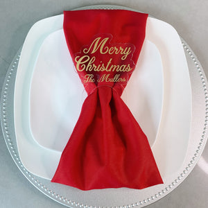 Set of Custom Gold Christmas Napkin Rings on Clear Acrylic