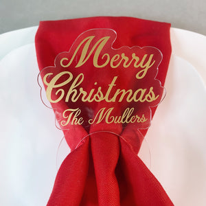 Set of Custom Gold Christmas Napkin Rings on Clear Acrylic