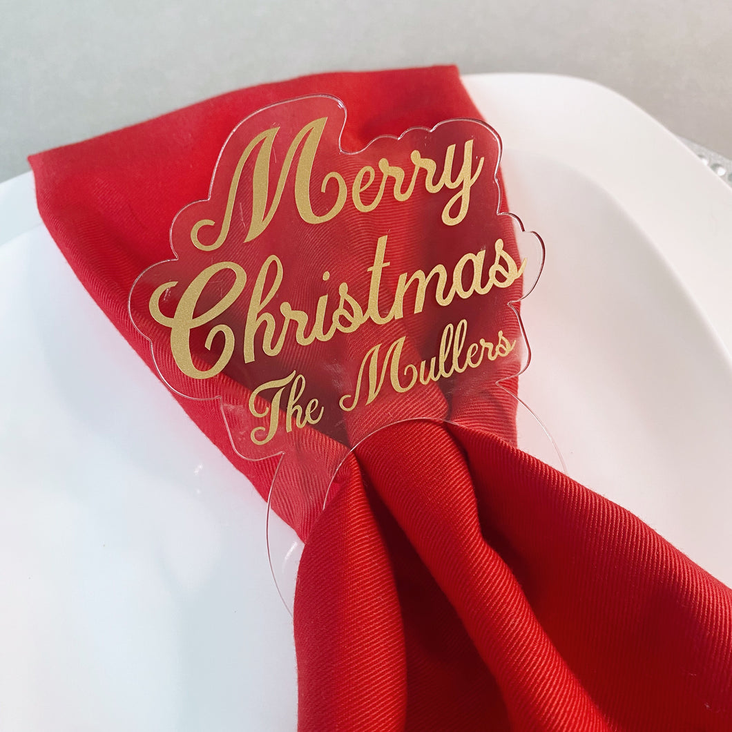 Set of Custom Gold Christmas Napkin Rings on Clear Acrylic